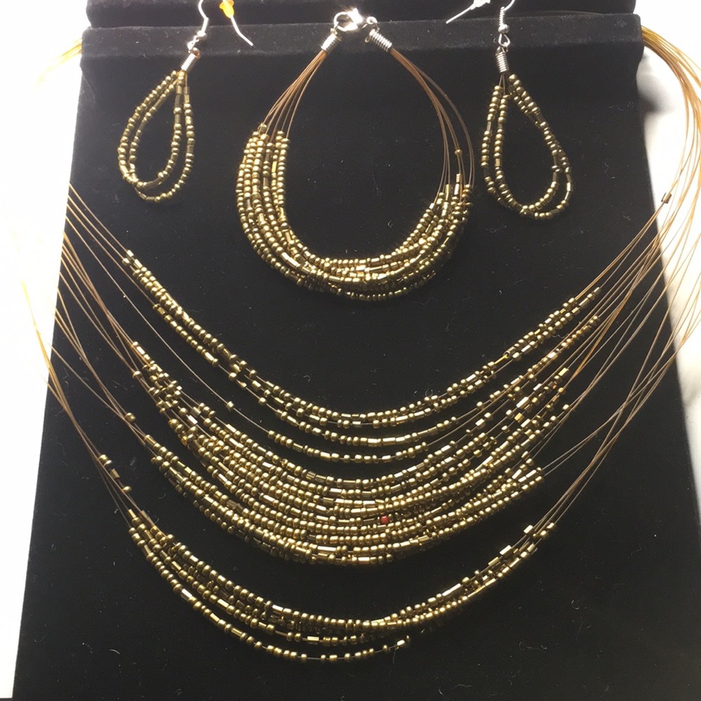 Bundle of Necklace, Bracelet and Earrings.